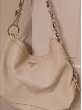 Authenticated Prada Vitello Daino Hobo Bag in supple cream/white pebbled leather